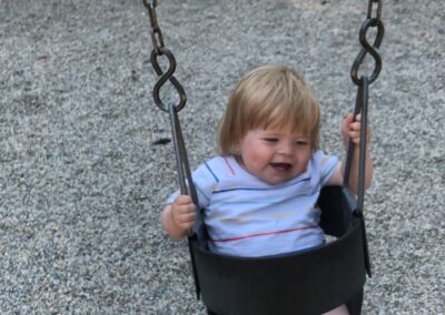 Wilder on a swing in Vernon, BC. Swinging and giggling and having fun.