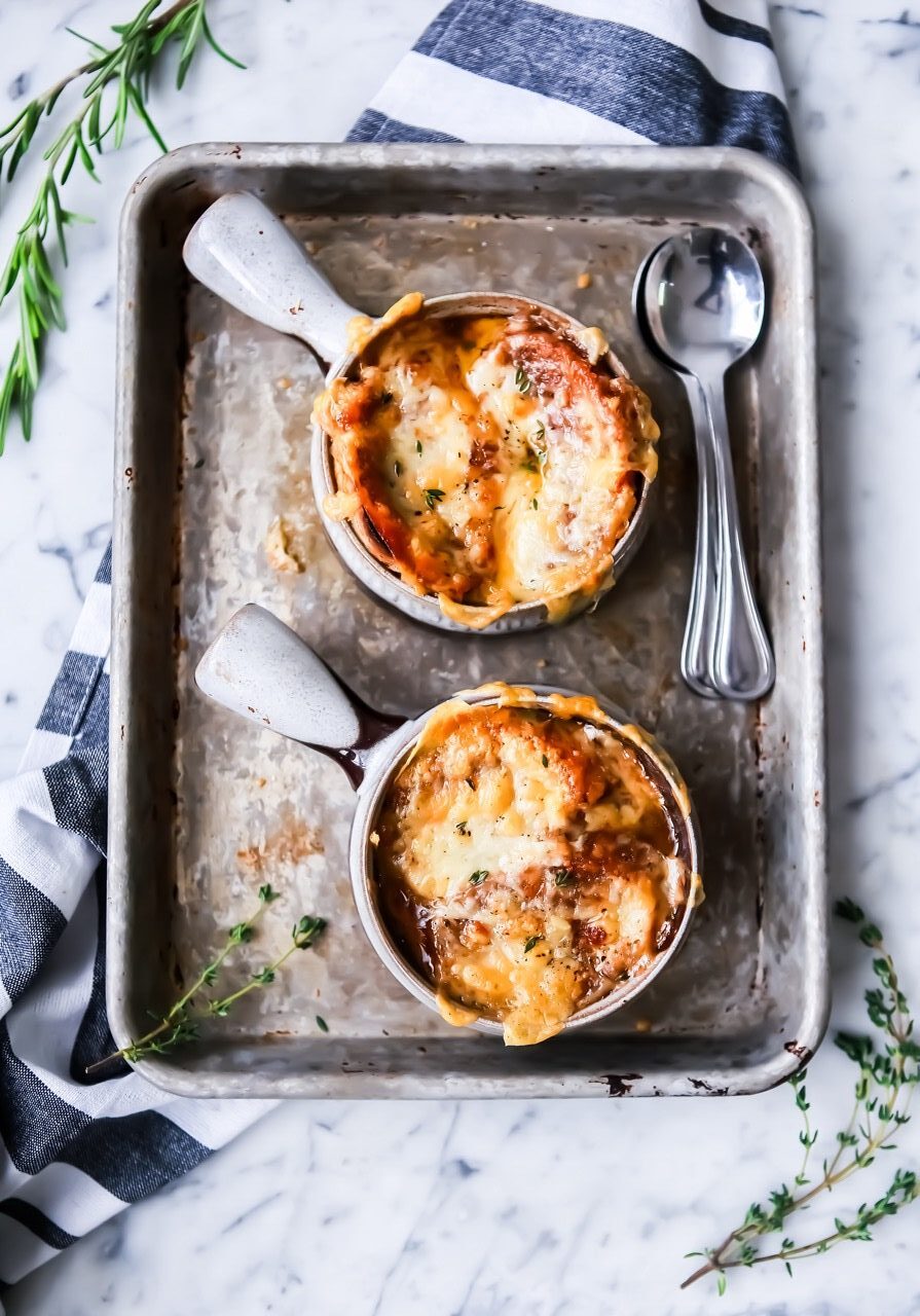 Two bowls of french onion soup 