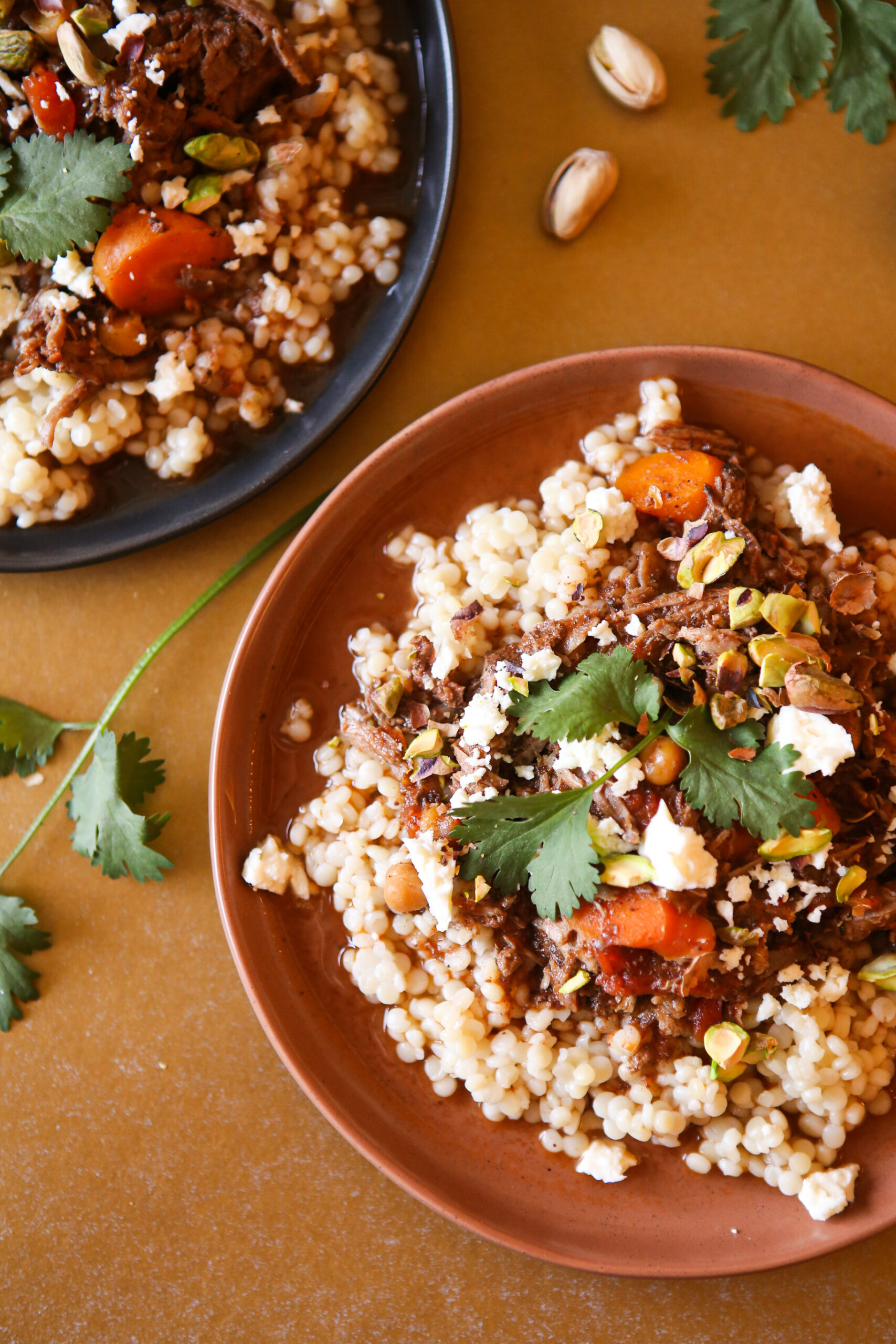 Moroccan beef stew served over couscous