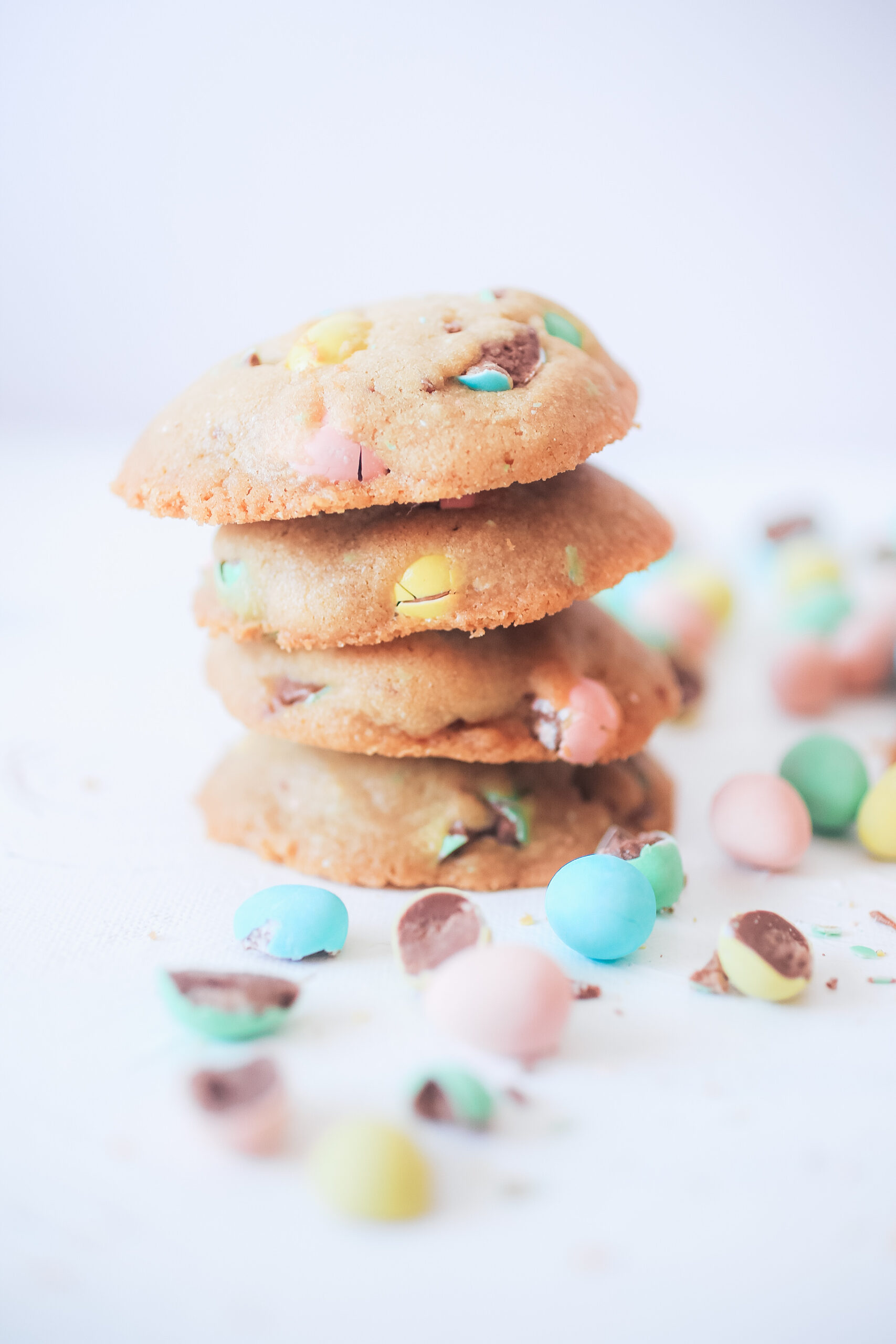 A stack of mini egg cookies one on top of the other. 