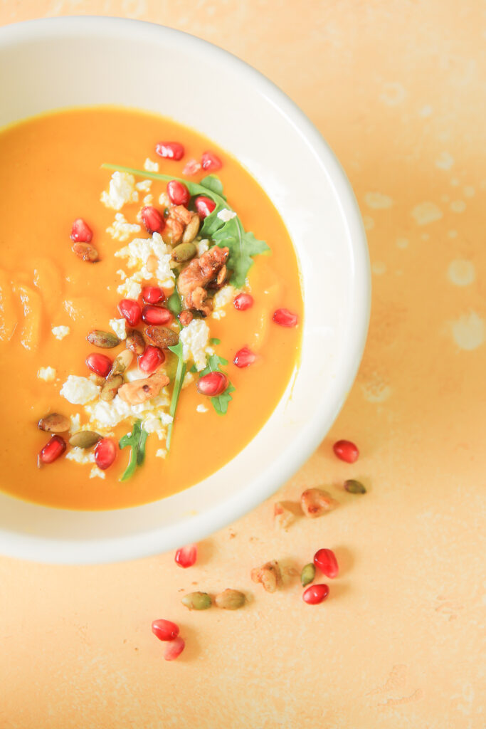 A beautiful bowl of butternut squash and apple soup